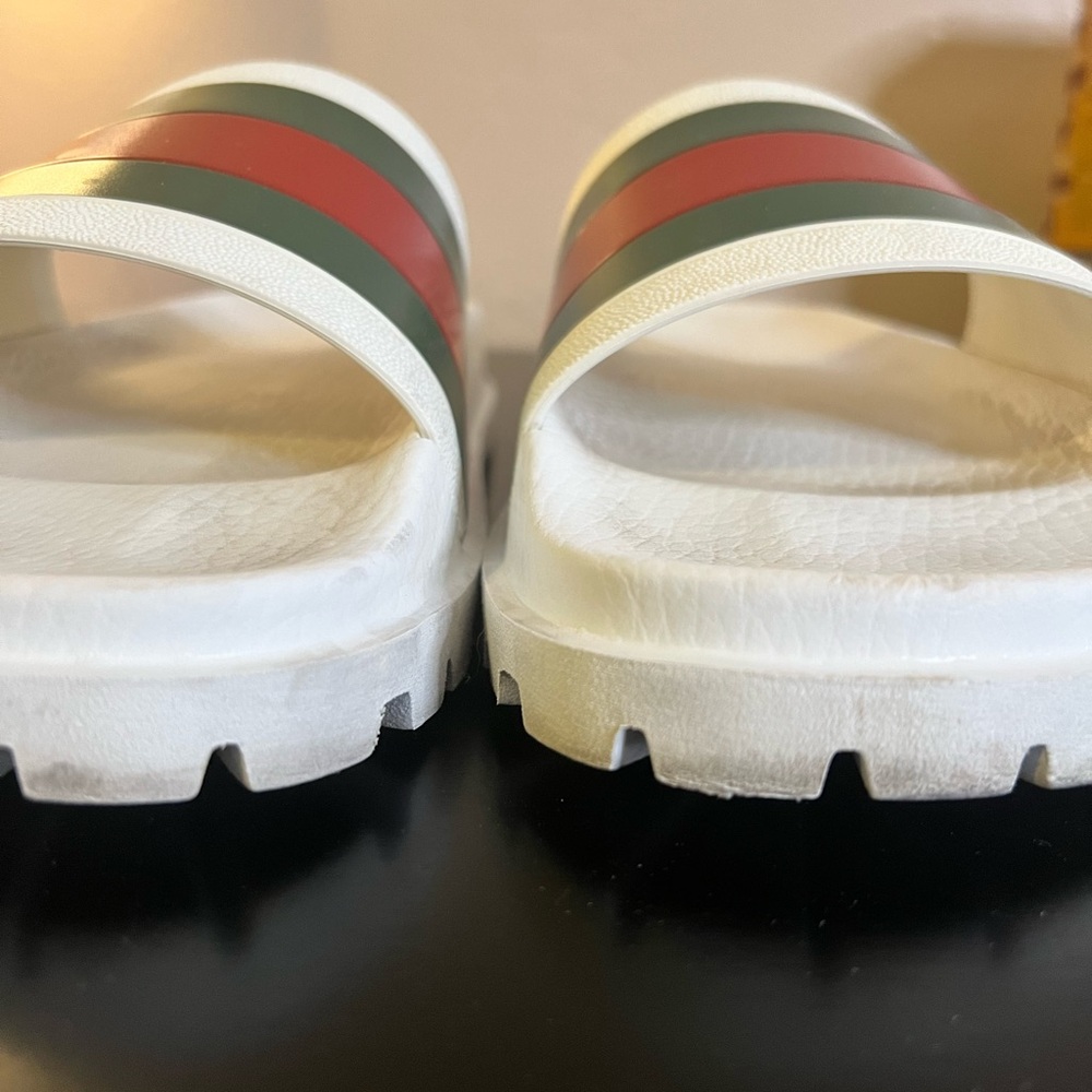 Gucci flip flops medium fit a little tight and I’m a 10.5